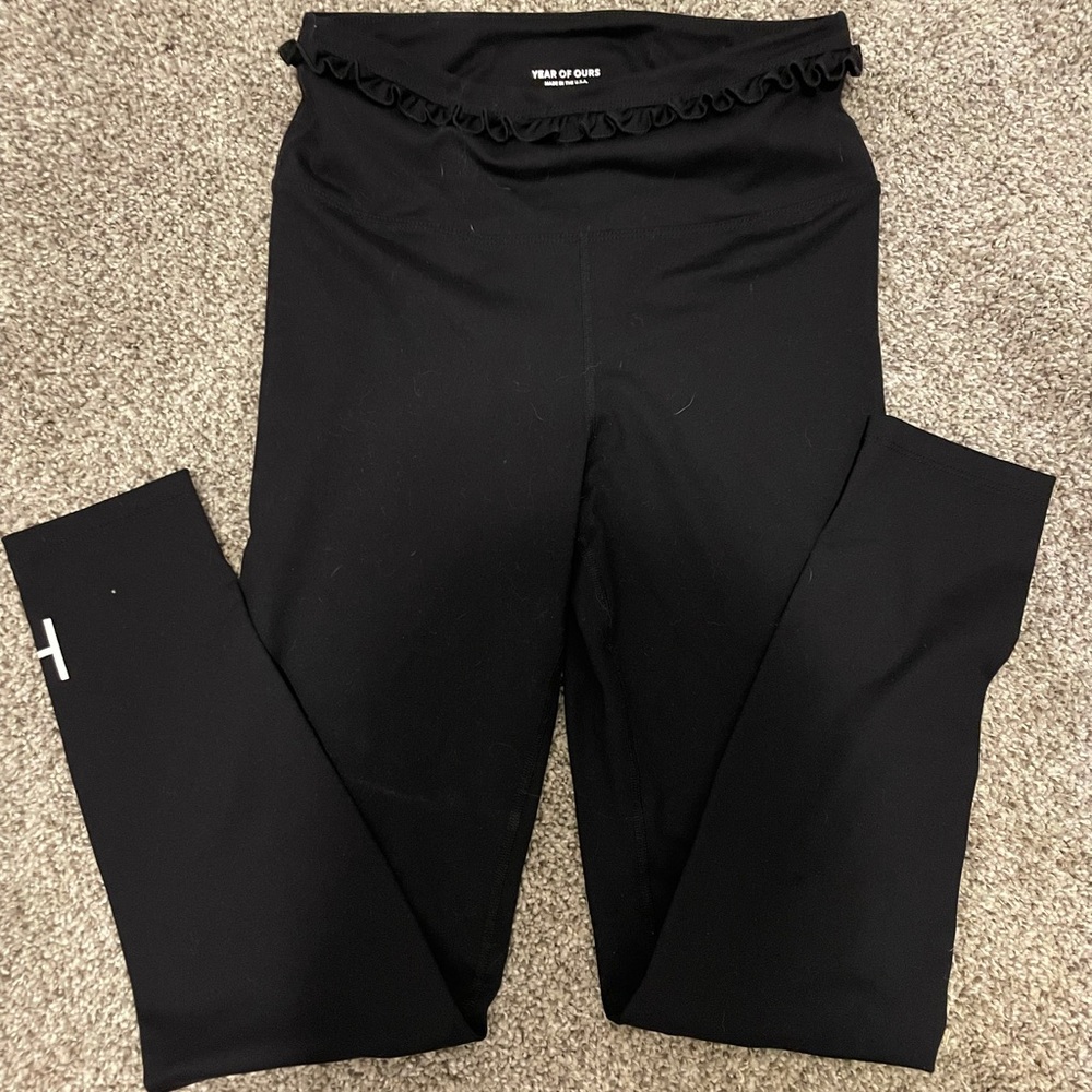 7/8 length black leggings with ruffle waist. Worn once, very soft.